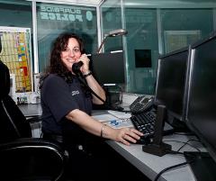 A Communications Officer working dispatch